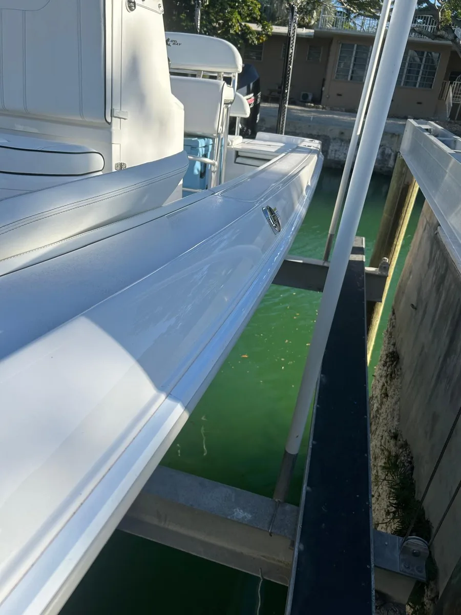 Contender 26 Bay hull restoration and gel coat buff shine, Panama City FL — stage 3